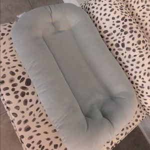 Snuggle Me Organic newborn lounger.